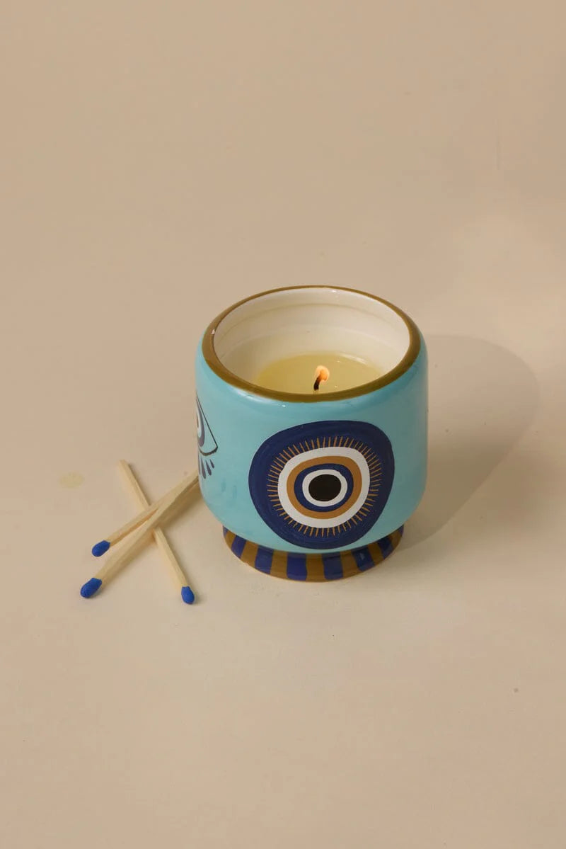 A DOPO 8 OZ "EYE" CERAMIC CANDLE - INCENSE & SMOK