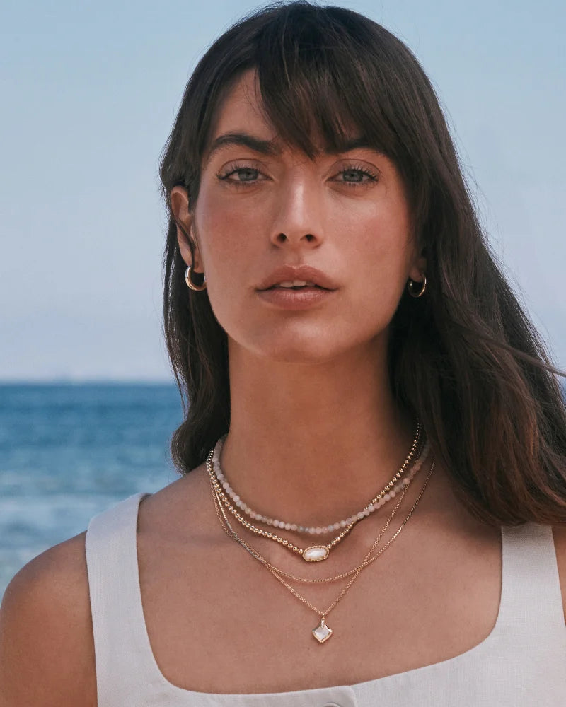 JOELLE MULTI STRAND NECKLACE GOLD IVORY MOTHER OF PEARL