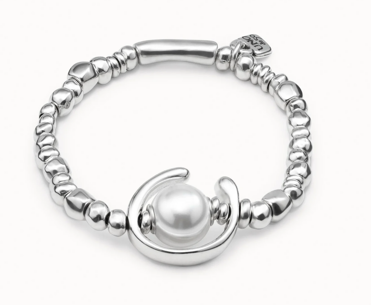 metal bracelet clad with sterling silver with pearl.