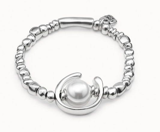 metal bracelet clad with sterling silver with pearl.