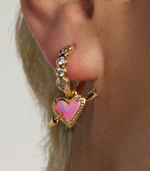ARI HEART ARROW HUGGIE EARRINGS GOLD PINK OPALESCENT RESIN